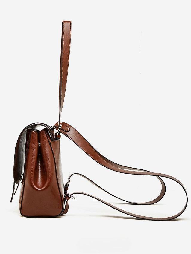 The Oil-Waxed Genuine Leather Convertible Flap Backpack Shoulder Bag