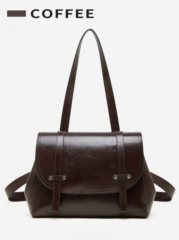 The Oil-Waxed Genuine Leather Convertible Flap Backpack Shoulder Bag