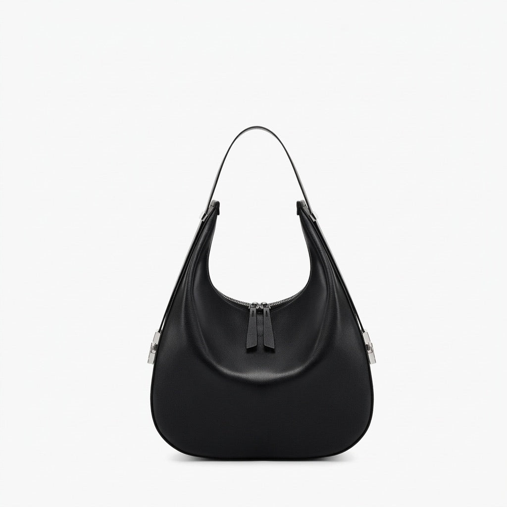 Borsa a tracolla a mezzaluna minimalista in vera pelle