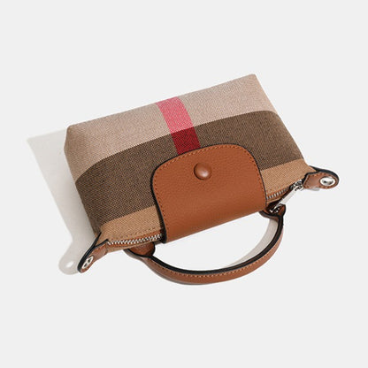 Bolso clutch bandolera de lona tejida con estampado clásico de cuadros británicos