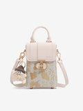 Elegante mini bolso de mano oriental de jacquard con solapa para el teléfono y colgante de peluche