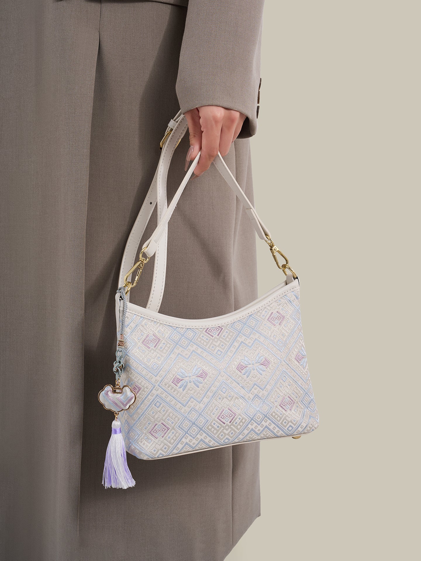 Graceful Geometric Vegan Eco-Leather Clutch Bag with Tassel Charm