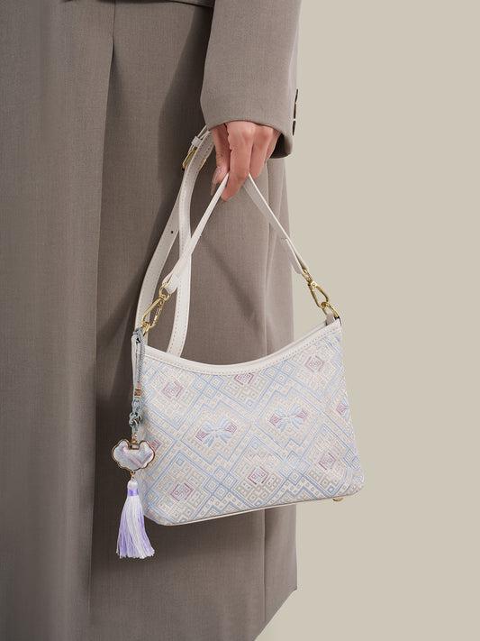 Graceful Geometric Vegan Eco-Leather Clutch Bag with Tassel Charm