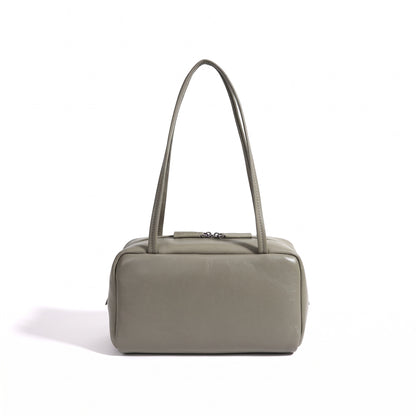 Bolso de mano tipo clutch minimalista de piel de oveja genuina con forma de bolera