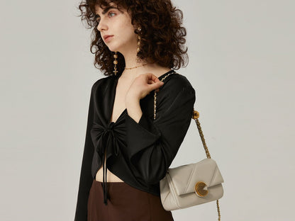 Spiral Turn-Lock Genuine Leather Quilted Crossbody Bag