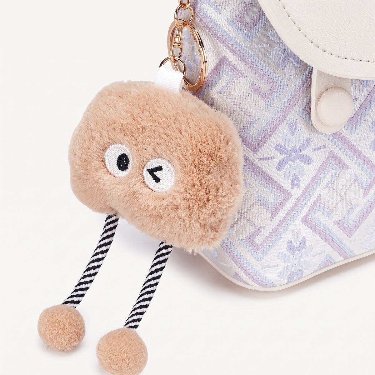 Mini sac bandoulière raffiné en cuir écologique végan avec jolie breloque
