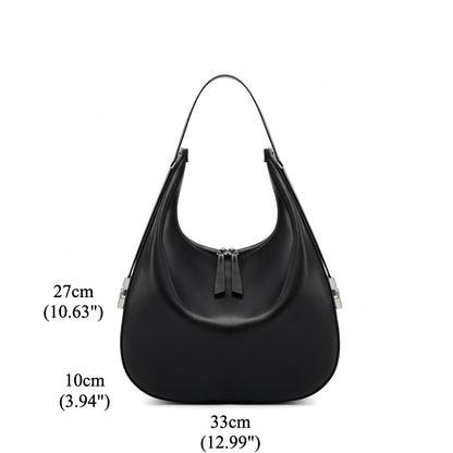Borsa a tracolla a mezzaluna minimalista in vera pelle
