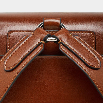 The Oil-Waxed Genuine Leather Convertible Flap Backpack Shoulder Bag