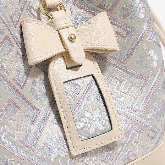 Delicate Geometric Vegan Eco-Leather Petite Bucket Clutch Bag with Bow Knot Charm