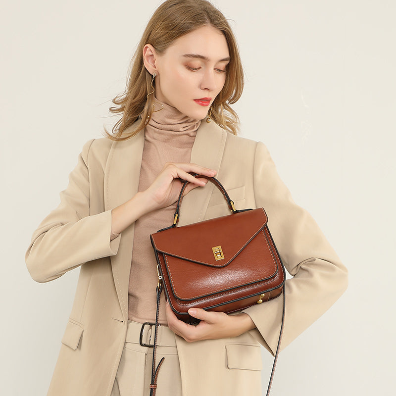 Borsa a tracolla postina da donna in vera pelle, elegante