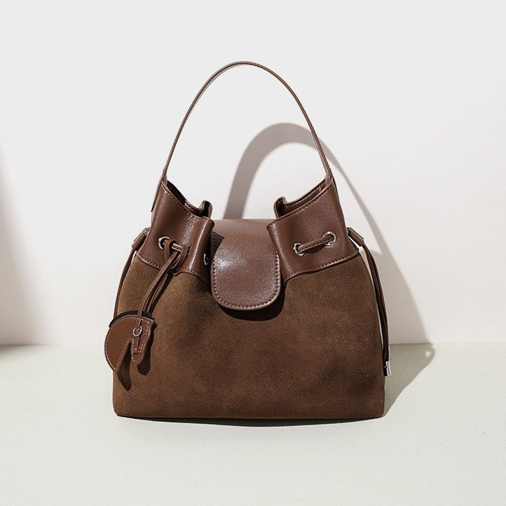 Chic Suede Leather Drawstring Bucket Bag with Horse Charm