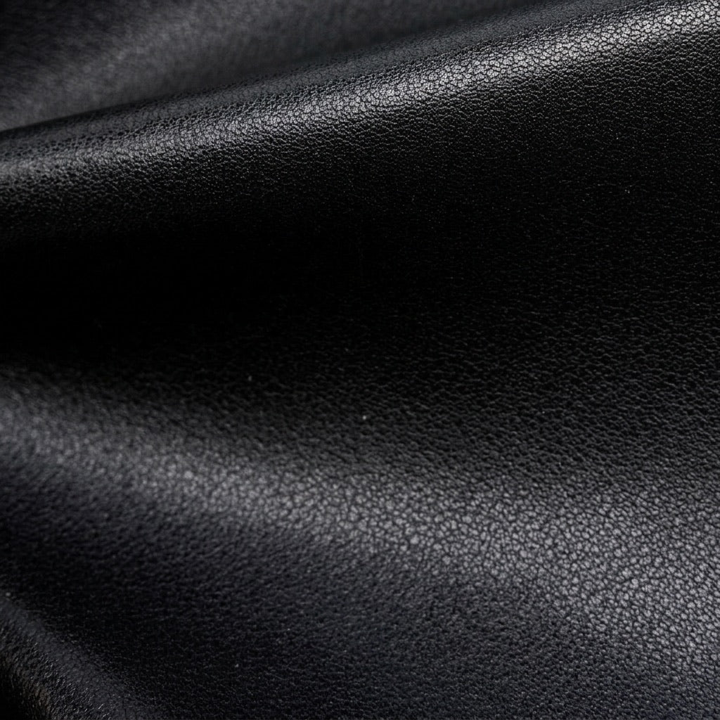 Borsa a tracolla a mezzaluna minimalista in vera pelle