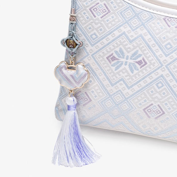 Graceful Geometric Vegan Eco-Leather Clutch Bag with Tassel Charm