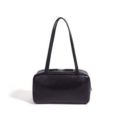 Bolso de mano tipo clutch minimalista de piel de oveja genuina con forma de bolera