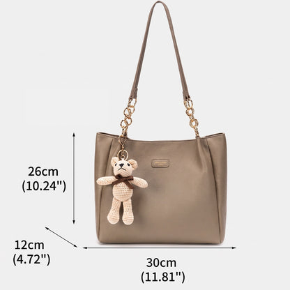 Borsa tote sofisticata e minimalista in ecopelle vegana martellata