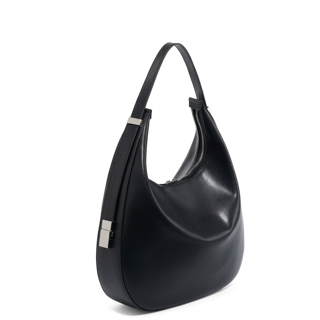 Borsa a tracolla a mezzaluna minimalista in vera pelle