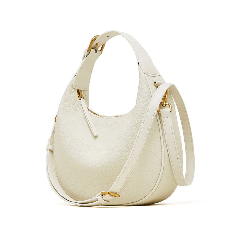 Borsa minimalista a spalla e tracolla a mezzaluna in vera pelle martellata