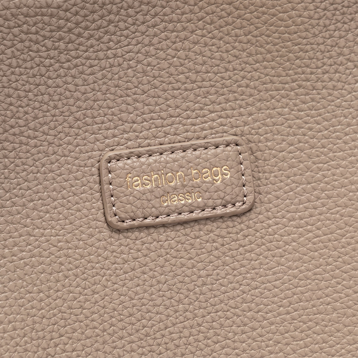 Borsa tote sofisticata e minimalista in ecopelle vegana martellata