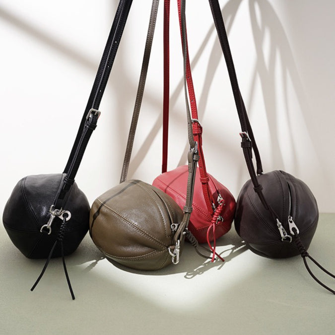 Modern Supple Genuine Sheepskin Leather Oval Rugby Clutch Bag