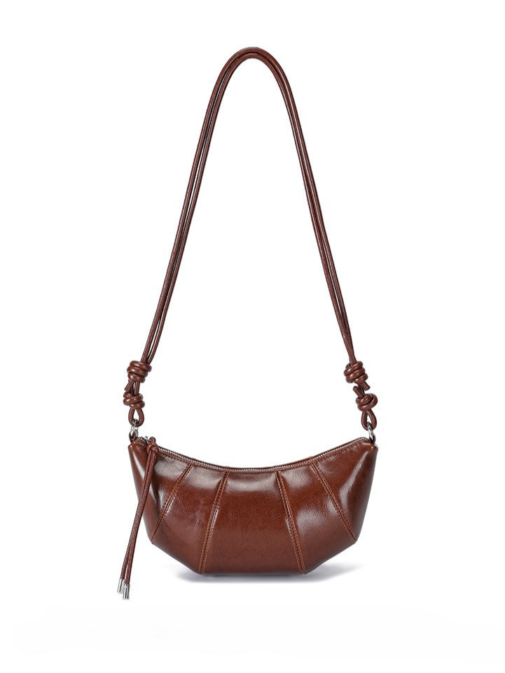 حقيبة أرتيزان كرواسون جلد طبيعي | حقيبة هوبو بسيطة مع عقدة ولوحات