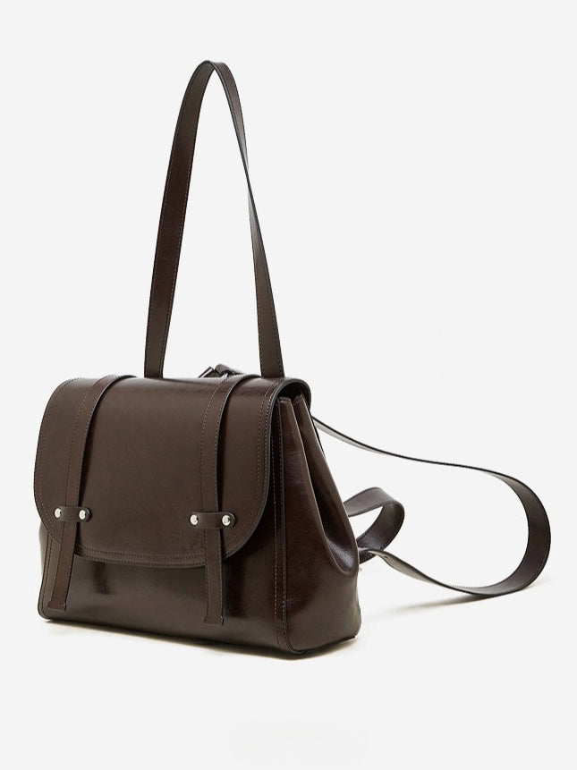 The Oil-Waxed Genuine Leather Convertible Flap Backpack Shoulder Bag