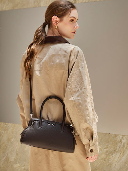 Sac pochette Boston en cuir véritable défini