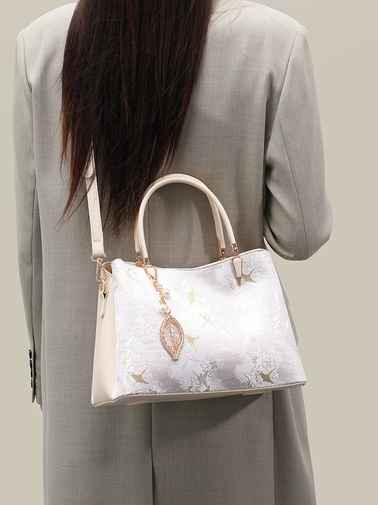 Sophisticated Oriental Jacquard Vegan Eco‑Leather Clutch Bag with Leaf Charm