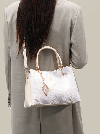 Sophisticated Oriental Jacquard Vegan Eco‑Leather Clutch Bag with Leaf Charm