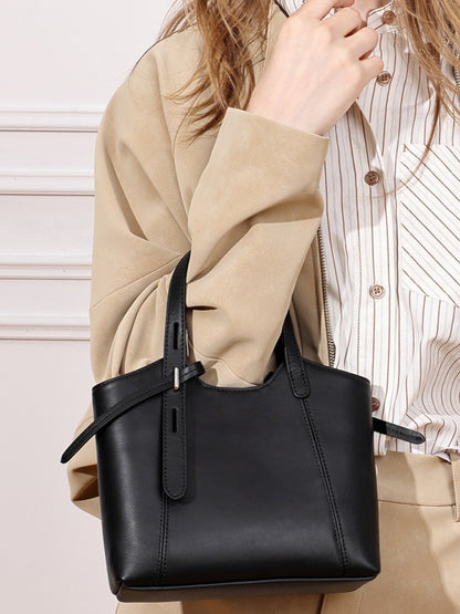 Sleek Genuine Leather Mini Bucket Clutch Bag with Adjustable Straps