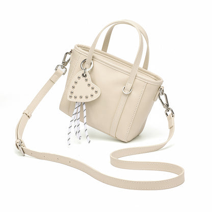 Mini tote a tracolla in vera pelle scolpita con distintivo cuore