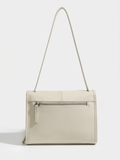 Borsa a spalla e tracolla minimalista in vera pelle testurizzata con patta