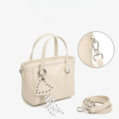 Sculpted Genuine Leather Mini Tote Crossbody Bag with Signature Heart Charm