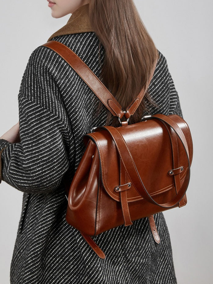 The Oil-Waxed Genuine Leather Convertible Flap Backpack Shoulder Bag