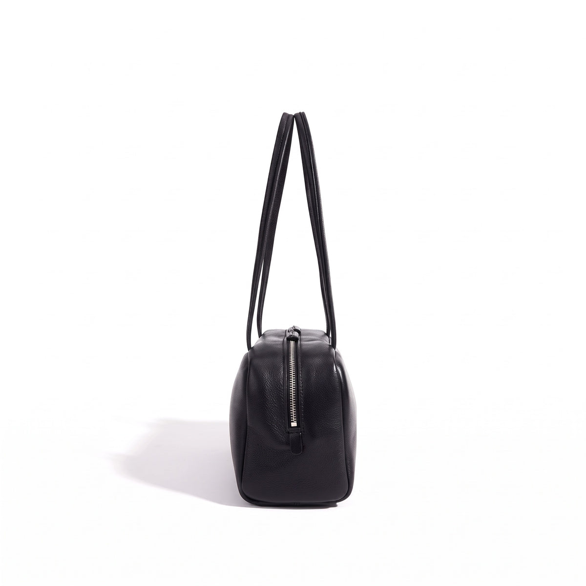 Bolso de mano tipo clutch minimalista de piel de oveja genuina con forma de bolera