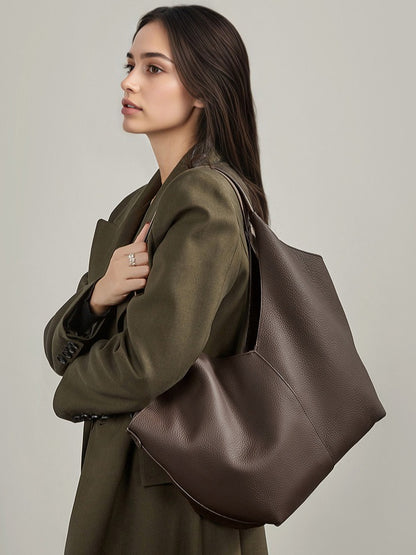 حقيبة إيثيرال في-كات جلد طبيعي | حقيبة هوبو بسيطة من جلد الحصى