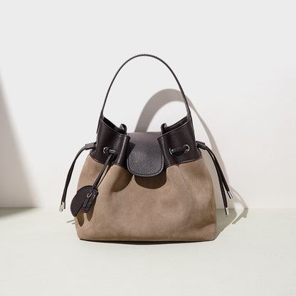 Chic Suede Leather Drawstring Bucket Bag with Horse Charm