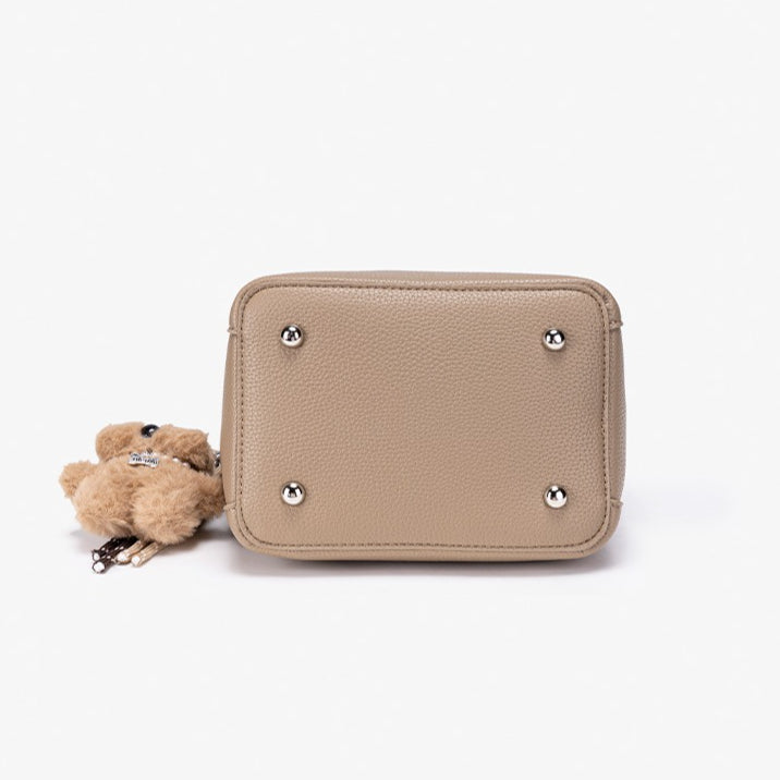 Mellow Pebble Textured Vegan Eco-Leather Bucket Bag with Fluffy Puppy Charm