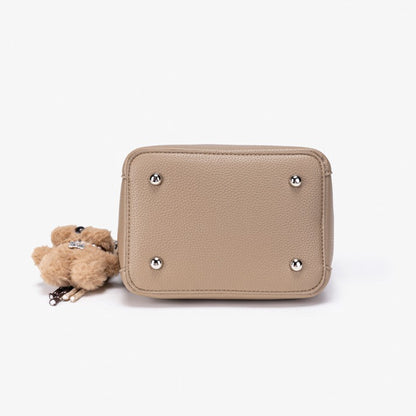 Mellow Pebble Textured Vegan Eco-Leather Bucket Bag with Fluffy Puppy Charm
