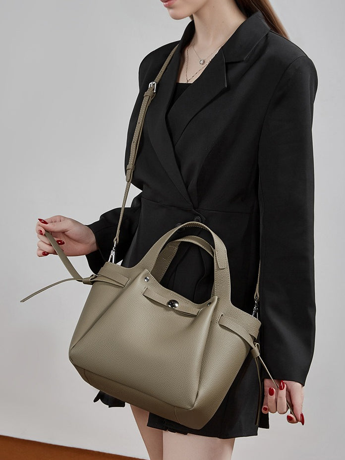 The Pebbled Genuine Leather Mini Bucket Tote Bag with Turn-Lock Closure
