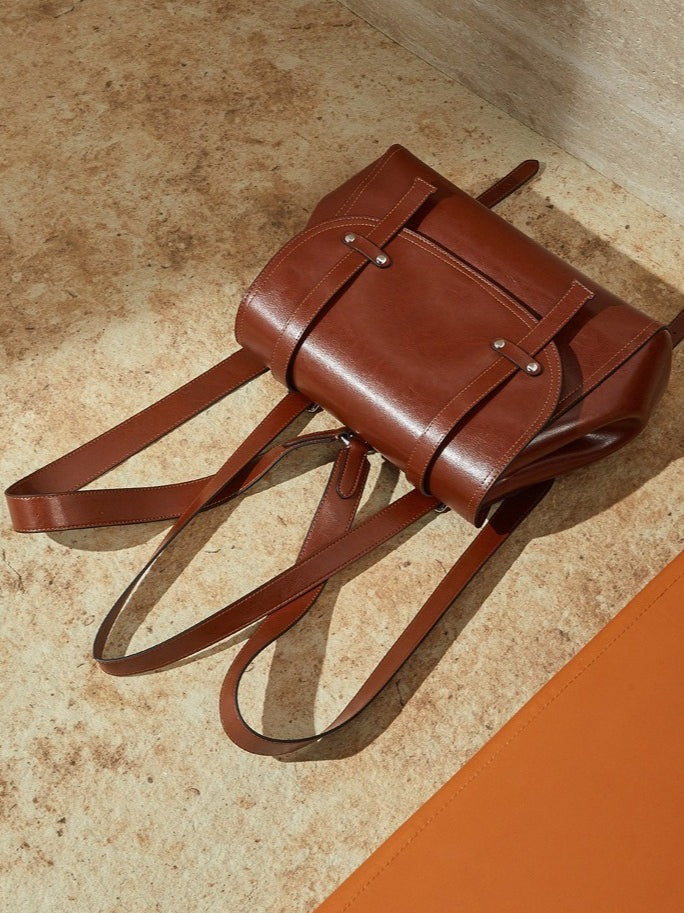 The Oil-Waxed Genuine Leather Convertible Flap Backpack Shoulder Bag