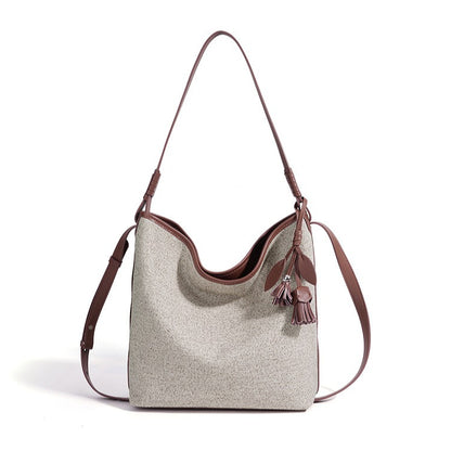 Slouchy Canvas Bucket Clutch Bag with Tassel Charm