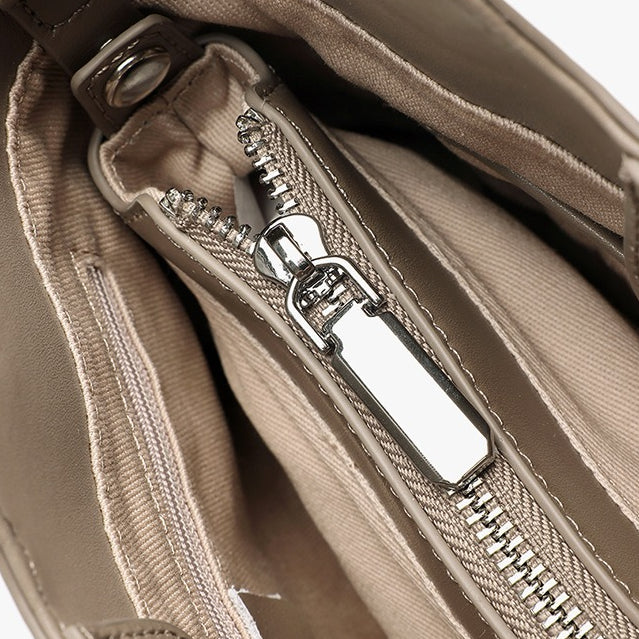 Sleek Genuine Leather Mini Bucket Clutch Bag with Adjustable Straps