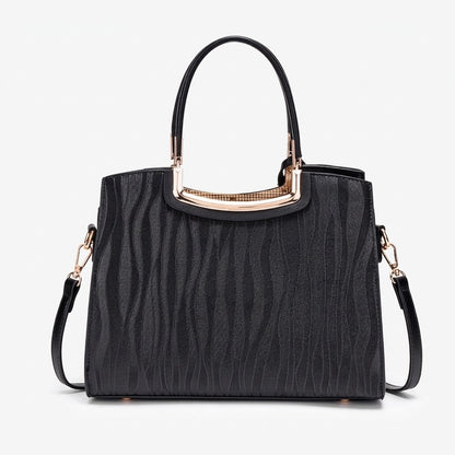Borsa pochette in ecopelle vegana dalla vivace texture ondulata