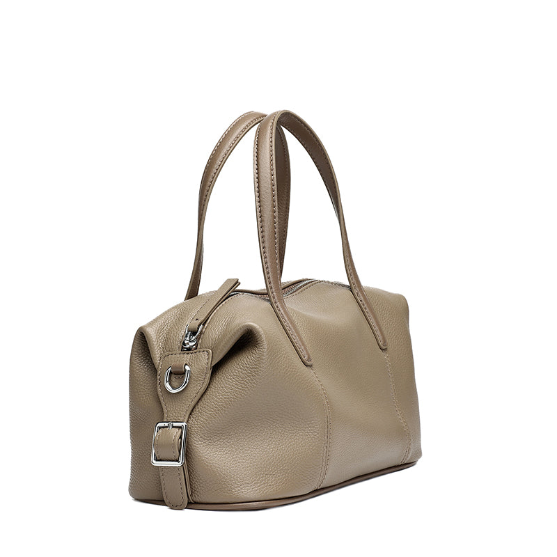 Borsa pochette a cuscino in vera pelle morbida dalla texture martellata