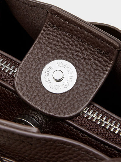 The Pebbled Genuine Leather Mini Bucket Tote Bag with Turn-Lock Closure