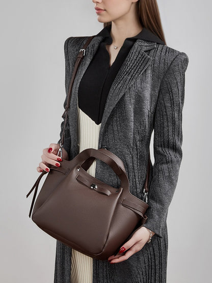 The Pebbled Genuine Leather Mini Bucket Tote Bag with Turn-Lock Closure