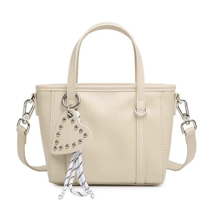 Mini tote a tracolla in vera pelle scolpita con distintivo cuore