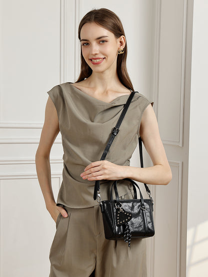 Mini tote a tracolla in vera pelle scolpita con distintivo cuore