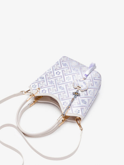 Opulent Brocade Vegan Eco-Leather Bucket Clutch Bag with Tassel Charm
