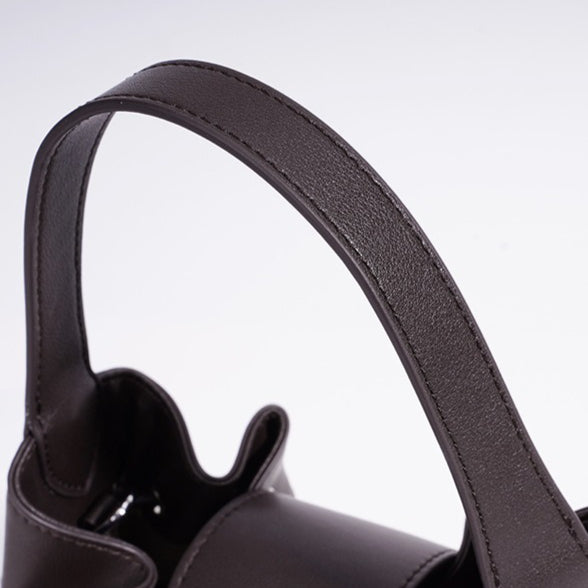 Chic Suede Leather Drawstring Bucket Bag with Horse Charm